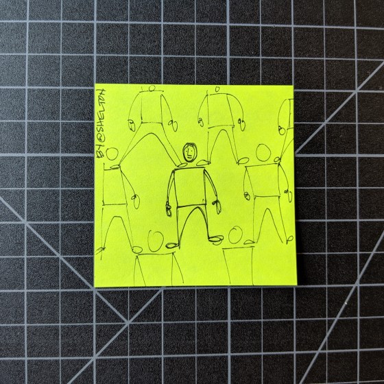 post it note with a sketch of people standing on each other's shoulders